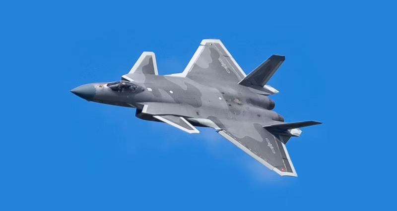 Chengdu J-20 in low-level flight at the 2022 Changchun Air Show, showing canard-delta planform and DSI intake design.