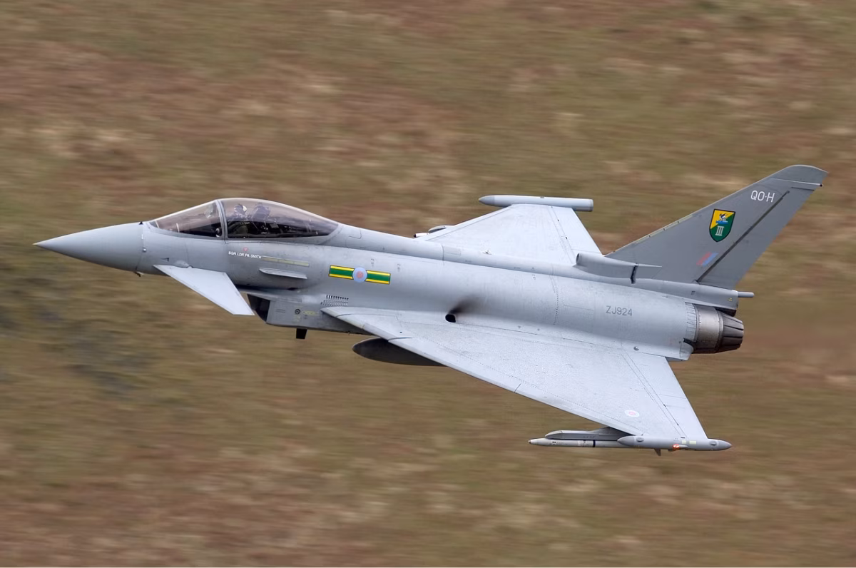 RAF Eurofighter Typhoon FGR4 (ZJ924) in low-level flight over moorland.