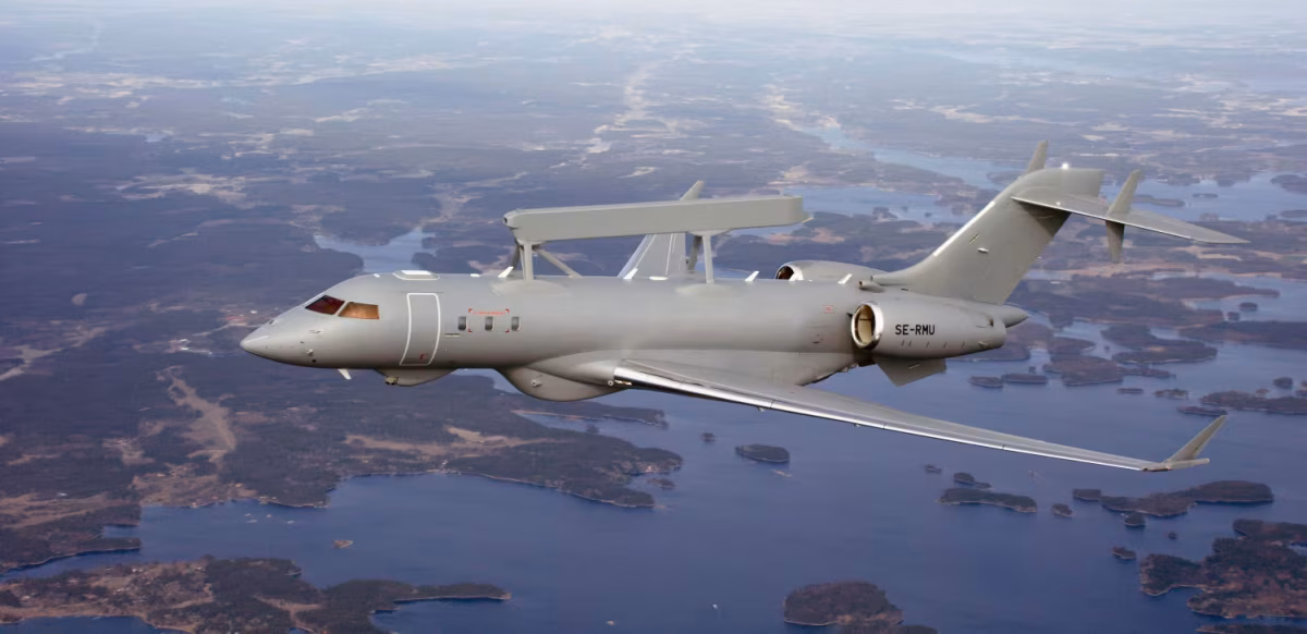 Saab GlobalEye AEW&C aircraft (registration SE-RMU) in flight, showing the dorsal Erieye ER radar housing on top of the Bombardier business jet fuselage