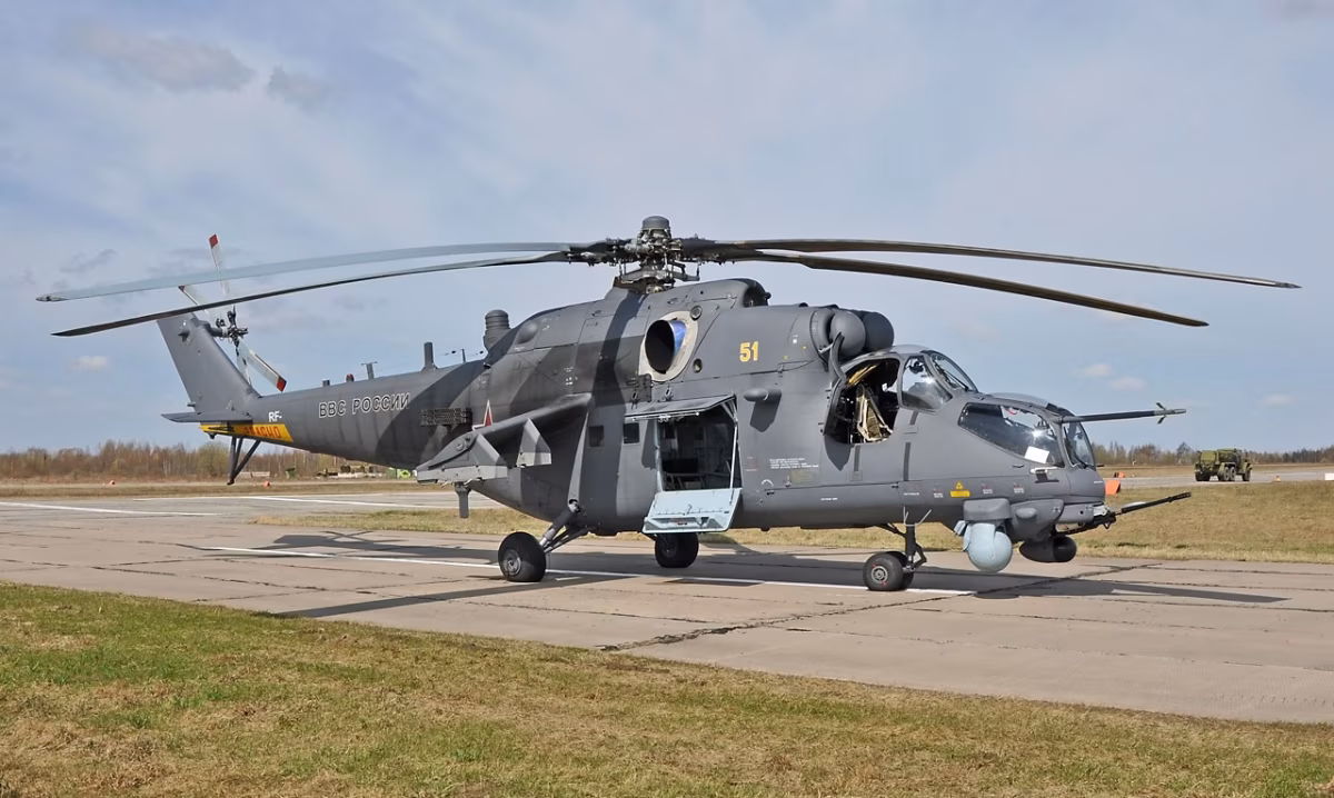 Russian Air Force Mi-35M on the ground, showing the modernized FLIR dome, updated cockpit, and grey camouflage scheme.